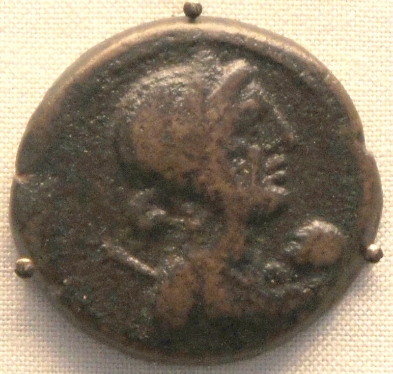 Ancient bronze coin of Cyprus showing Cleopatra VII holding the infant Caesarion, British Museum